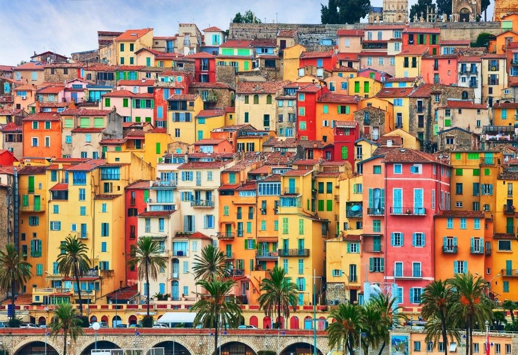 Colourful houses above the seafront in Menton